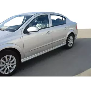 Бічні спідниці Sedan (під фарбування) для Opel Astra H 2004-2013рр