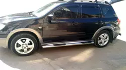 Бічні труби (2 шт., нерж) для Mitsubishi Outlander 2001-2006 рр Бічні труби (2 шт., нерж) для Mitsubishi Outlander 2001-2006 рр