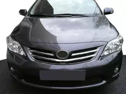 Накладки на решітку радіатора (2010-2013р, 3 шт, нерж.) для Toyota Corolla років Накладки на решітку радіатора (2010-2013р, 3 шт, нерж.) для Toyota Corolla років